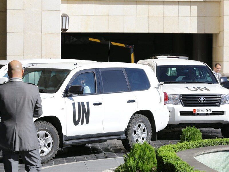 De auto's van de wapenexperts bij hun hotel in Damascus.