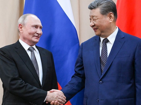  Russische president Vladimir Poetin en de Chinese leider Xi Jinping