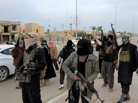 Strijders in Ramadi, vermoedelijk van de Islamitische Staat van Irak.