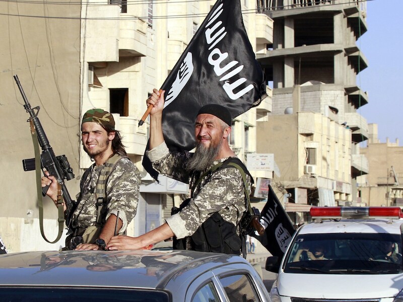 IS-strijders in de Syrische stad Raqqa.