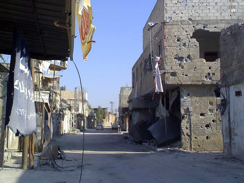 De zwaarbeschadigde stad Duma dicht bij de Syrische hoofdstad Damascus.