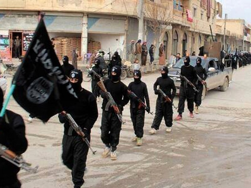 IS-strijders in de Syrische stad Raqqa. De Tsjetsjeense moeder van Aysha (8) en haar broertje Luca (7) liet via Facebook weten dat ze in Raqqa verblijven.