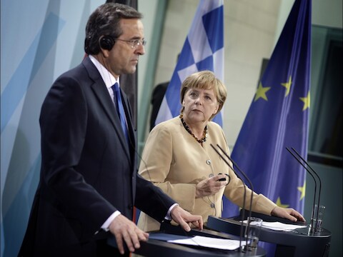 De Griekse premier Antonis Samaras op bezoek bij de Duitse bondskanselier Angela Merkel.