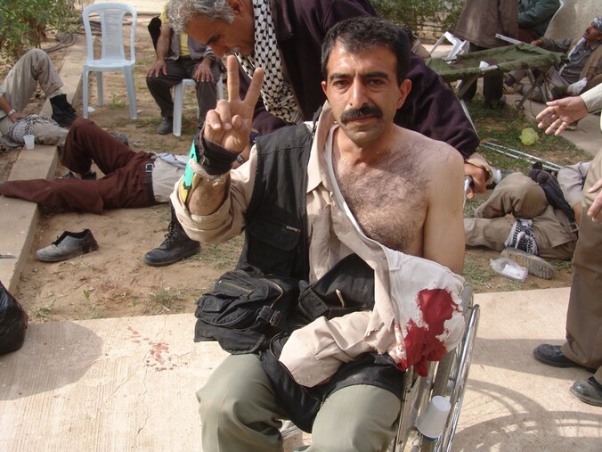 Een vluchteling uit kamp Ashraf in Irak.