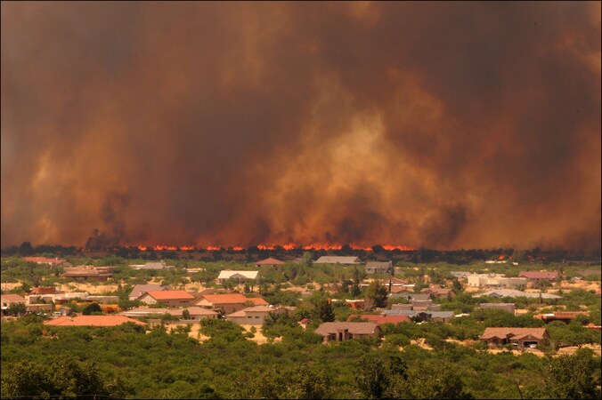 Brand in het Amerikaanse Arizona. De kost van natuurrampen kan een nieuwe wereldwijde crisis veroorzaken, waarschuwen de VN.