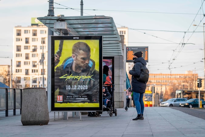 De release van ‘Cyberpunk 2077' ging in december 2020 gepaard met een grote promotiecampagne, zoals hier in de Poolse hoofdstad Warschau. 