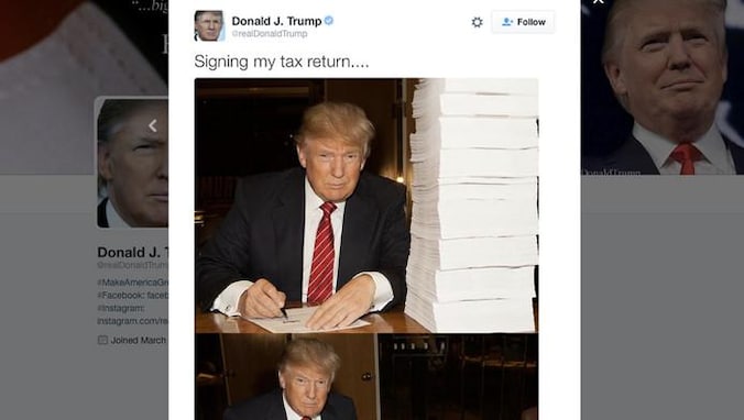 Tijdens de verkiezingscampagne gaf Donald Trump deze foto vrij waarin hij naar eigen zeggen zijn belastingaangifte ondertekent.