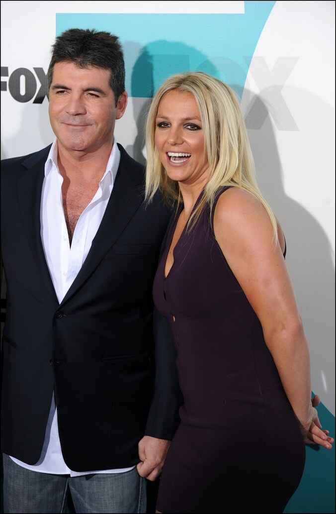 Simon Cowell en Britney Spears bij de persvoorstelling van X Factor