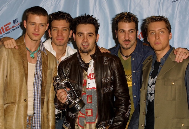Justin Timberlake (L) eind jaren 90 met de bandleden van NSYNC.