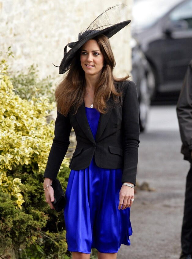 Kate met de zwarte hoed op het huwelijk van Harry Meade