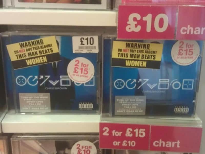 "Excellent stickers on Chris Brown CDs in HMV"