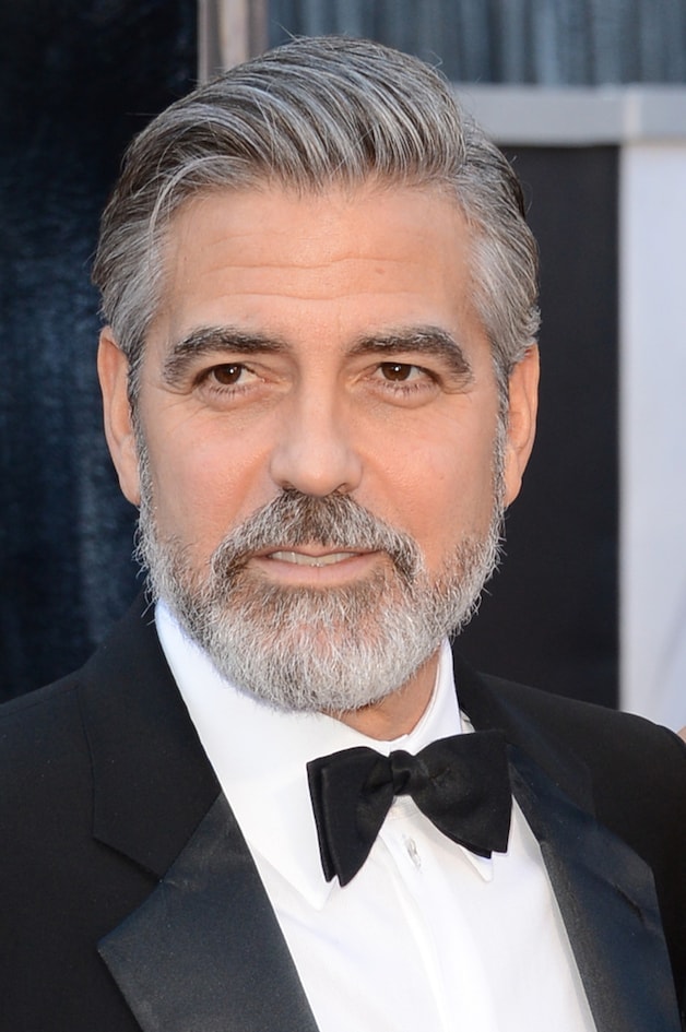 George Clooney met volle baard.