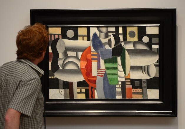 Trois Femmes à La Table Rouge van Fernand Leger