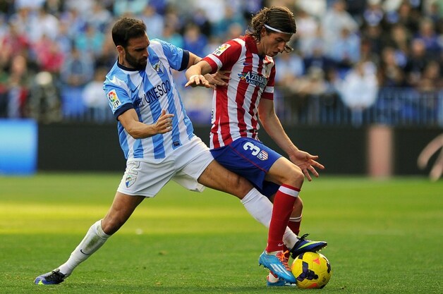 Filipe Luis (rechts) zorgde ei zo na voor een own-goal.