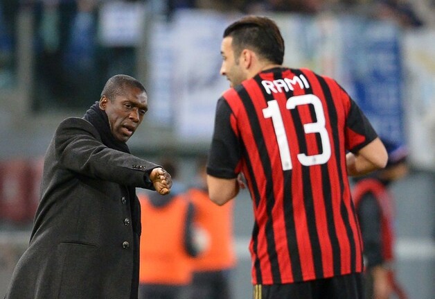 AC Milan-trainer Clarence Seedorf (L).