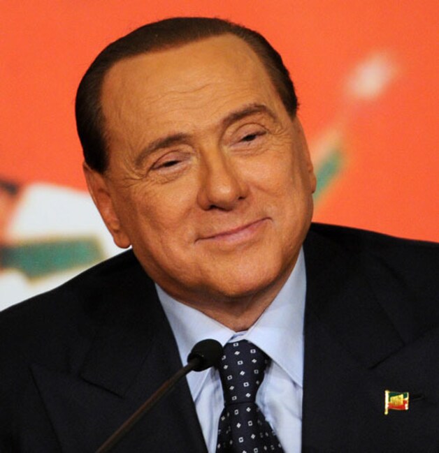 Berlusconi: fier op zijn poedeltje.