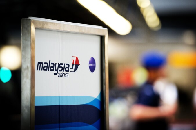 De incheckbalie van Malaysia Airlines op luchthaven Schiphol.