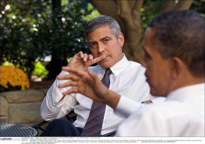 George Clooney tijdens een ontmoeting met president Obama.