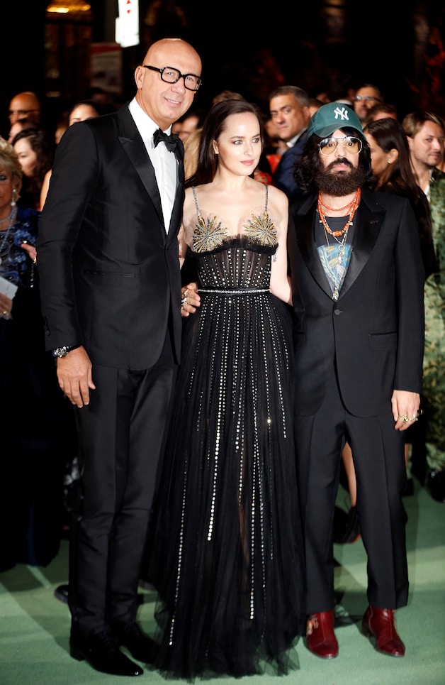 Gucci-CEO Marco Bizzarri (links) tijdens de Milan Fashion Week.