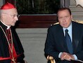 Kardinaal Angelo Bagnasco en Silvio Berlusconi tijdens een ontmoeting in 2011.