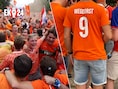 “Ik heb 3.500 euro betaald. Natuurlijk ben je dan niet goed snik”: een dag in het spoor van de unieke Oranje-gekte in Berlijn