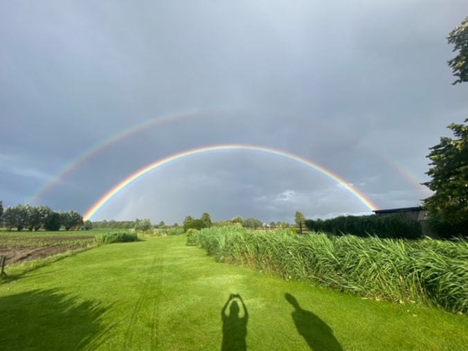 De dubbele regenboog boven Lievegem.