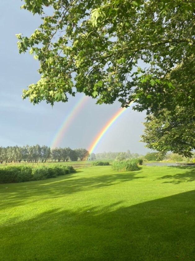 De dubbele regenboog boven Lievegem.