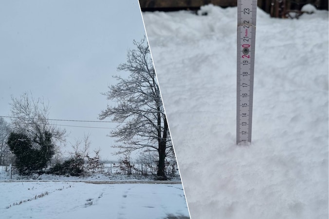 Een meetlat toont aan dat er 11 cm sneeuw ligt.