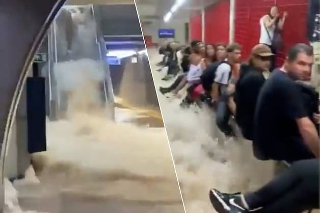 KIJK. Water gutst door Braziliaanse metro door noodweer, mensen kunnen ...