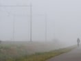 Zon en lokaal nevel of mist in Aartselaar in de ochtend