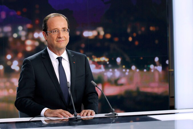 Volgens de Franse president François Hollande was de top van de veiligheidsdiensten te dik met zijn voorganger Sarkozy.