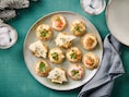 Niet één, maar vier keer feest: blini’s met verschillende smaakvolle toppings
