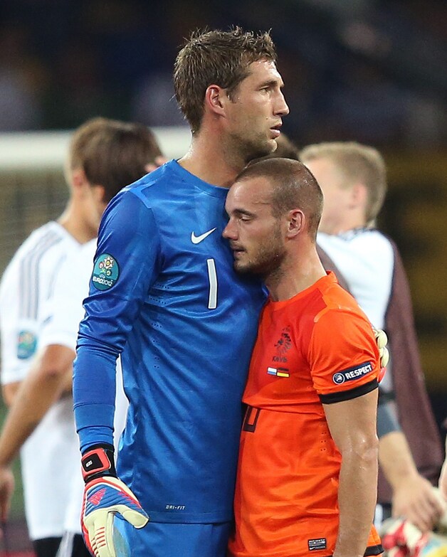 Stekelenburg met Sneijder.