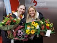 Overladen met bloemen en tekeningen: Belgische atleten krijgen warme ontvangst bij terugkeer