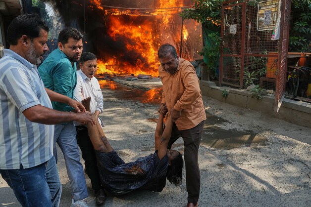 Local residents help with the liberation action.