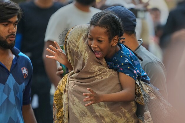 A girl after being rescued from the burning hotel.