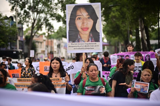 Members of the 'Madres Buscadoras': the 'searching mothers' who carry photos of missing people.
