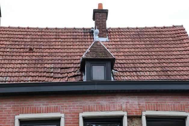 The roof of the house was also damaged by the explosion. 