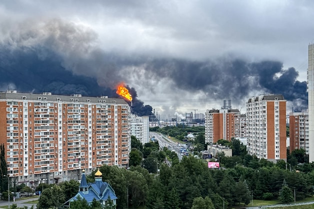 There are black roofs in two beautiful apartment buildings in Moskou 