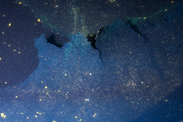 Algae and peeling paint in the mirror pond.