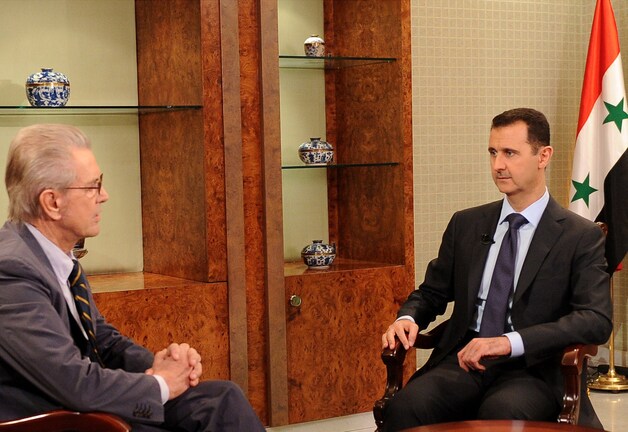 Jürgen Todenhöfer in 2012 in gesprek met de Syrische president Assad.
