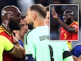 KIJK. Twee vingers de lucht in en quasi neus aan neus: Romelu Lukaku gaat in slot in de clinch met Gianluigi Donnarumma