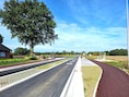 Deusterstraat in Peer na een jaar werken opnieuw open: nieuwe fietspaden en asfaltlaag