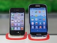 Een iPhone 4S en een Galaxy SIII.