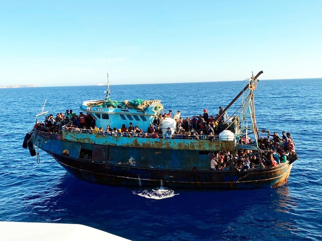 Migranten op Lampedusa. Beeld van vorige maand.