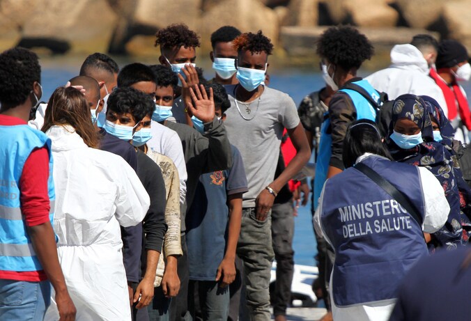 Migranten op Lampedusa. Beeld van vorige maand.
