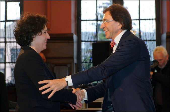 Turtelboom en Di Rupo bij de ondertekening van de Salduz-wet.