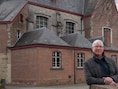 André Van De Sompel geeft de lezing in Laarne.