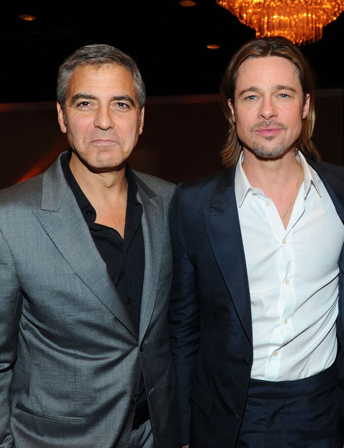 George Clooney en Brad Pitt in 2012 bij de Oscaruitreiking.