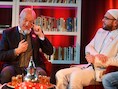 Gesprek tussen komiek Geert Hoste en imam Wim Van Ael.